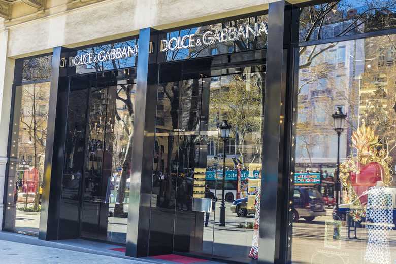 a Dolce & Gabbana store window, showcasing their collection