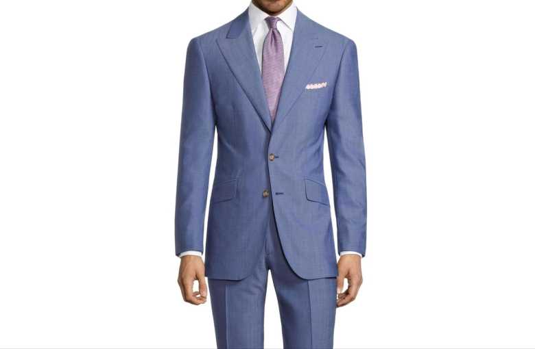 A light blue suit, combined with a white shirt and a purple tie by Oliver Wicks