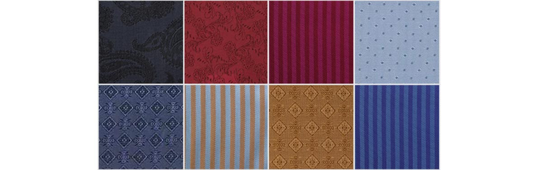 8 suit jacket lining samples of varying patterns and colors